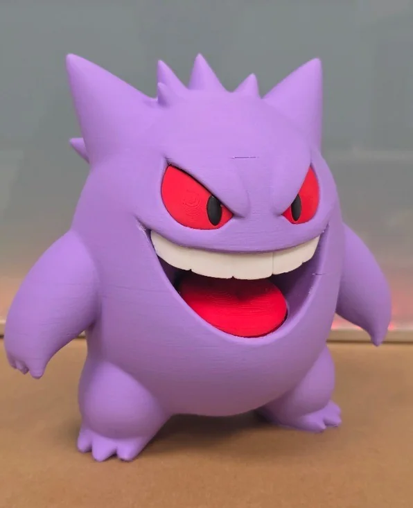 Figura 3D de personaje en color morado